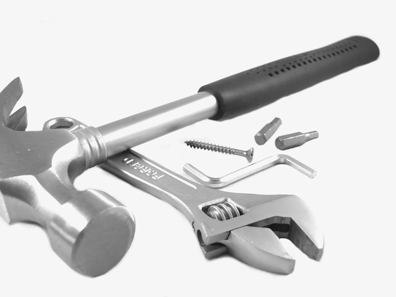 How do you properly use a torque wrench?